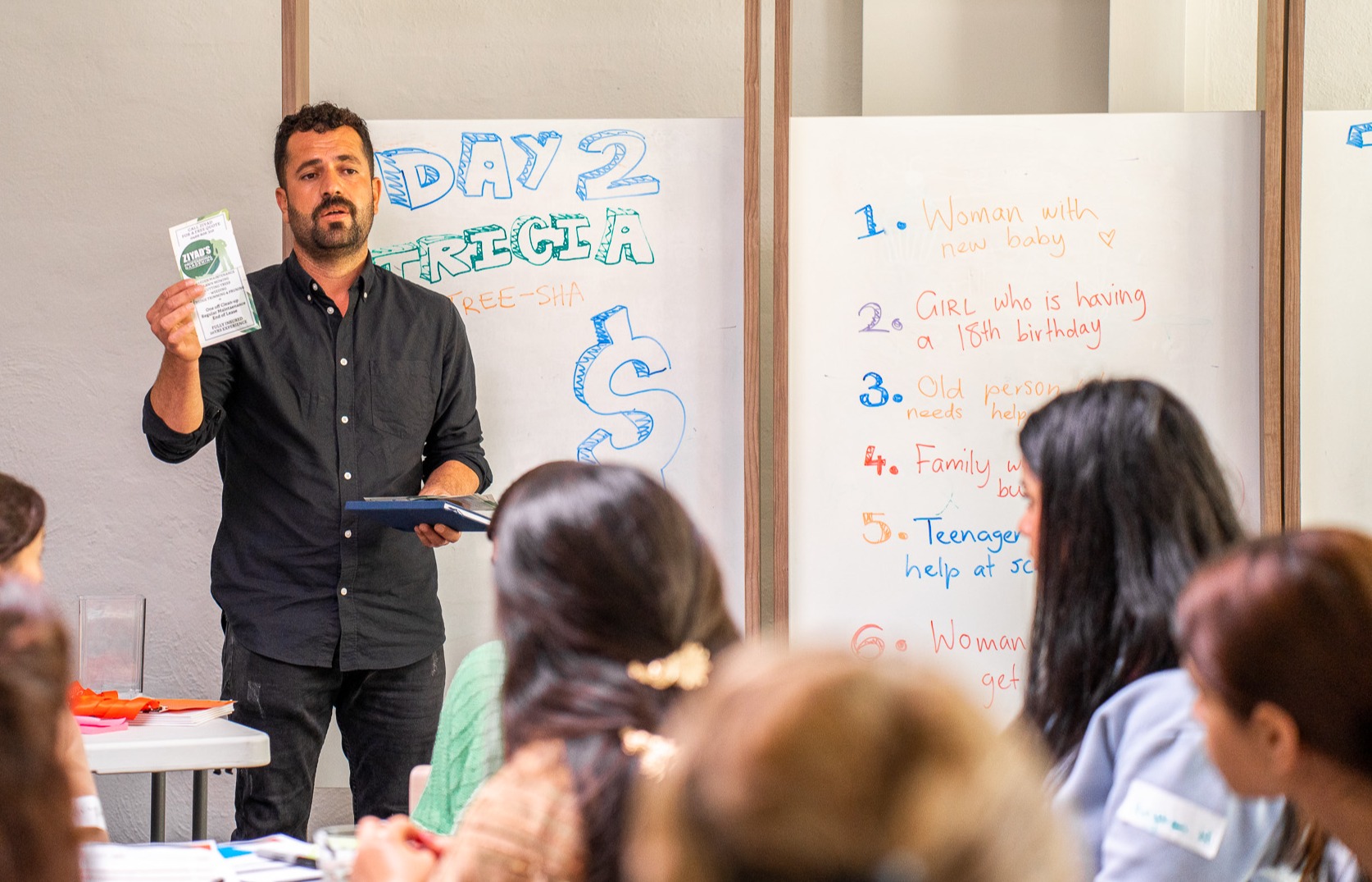 Man standing in front of a classroom