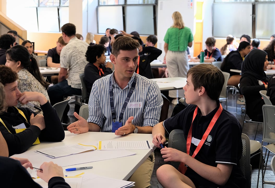 Facilitator Matt with a student during Discovery workshop